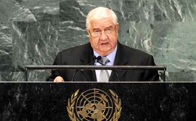 Walid Muallem, the deputy prime minister and foreign minister of Syria, addresses the 67th United Nations General Assembly on Monday. Photo: Xinhua