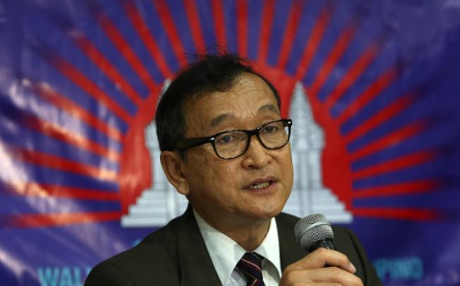Cambodian opposition party leader Sam Rainsy speaks during a press conference in San Juan City, east of Manila, on September 10. Photo: EPA