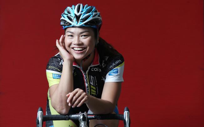 Lee Wai-sze trains almost every day, working out and spending long hours on the bicycle, and discussing training routines and tactical approaches with her coach. Photo: SCMP
