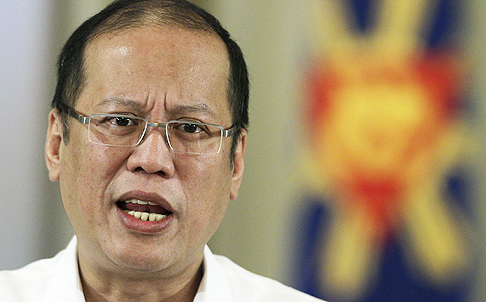 Philippine President Benigno Aquino delivers a speech on television on Sunday, announcing a preliminary peace agreement with the nation’s largest Muslim rebel group. Photo: AP