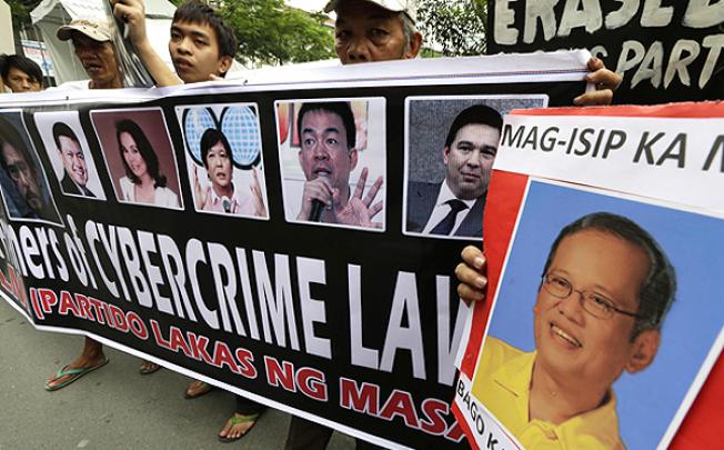 Protesters rally against controversial new anti-cybercrime laws in Manila. Photo: AFP