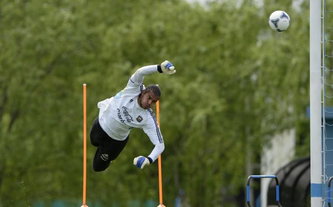 Argentina's goalkeeper Sergio Romero trains ahead of the World Cup qualifier against Uruguay on Friday. Photo: AFP