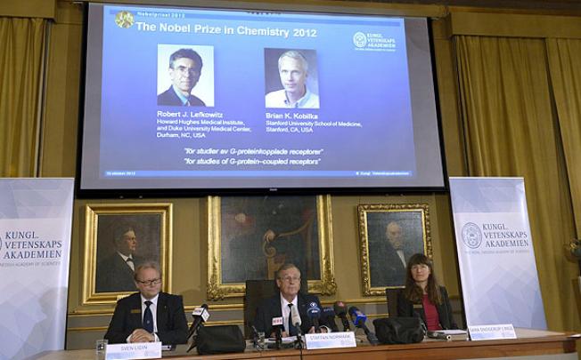 Americans Robert Lefkowitz and Brian Kobilkaare awarded the Nobel Prize in Chemistry at the Royal Swedish Academy of Science in Stockholm. Photo: EPA