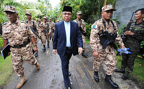 Murad Ebrahim (centre), leader of the Moro Islamic Liberation Front. Photo: AFP