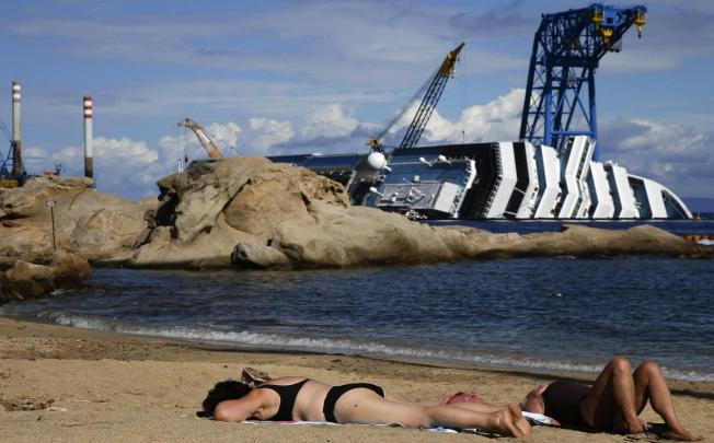 It had been hoped the Costa Concordia could be refloated by March, but the salvors are already two months behind schedule. Photo: Reuters