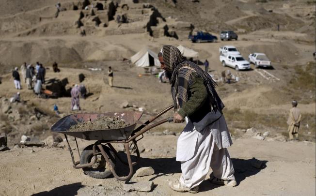 Archaeologists work near Kabul before miners move in. Photo: AP