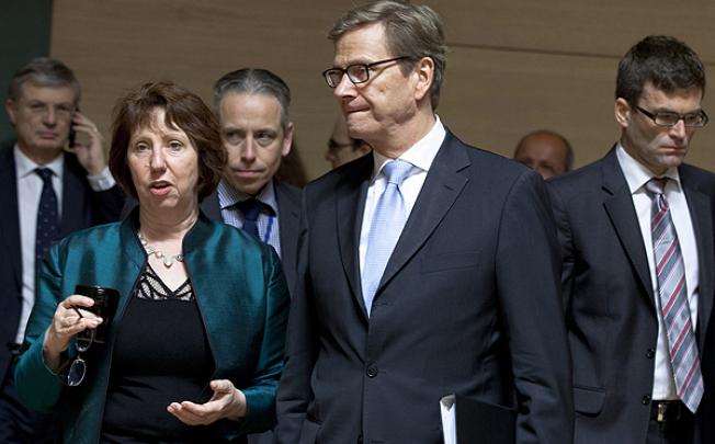 EU High Representative Catherine Ashton speaks with German Foreign Minister Guido at a meeting of EU Foreign Ministers in Luxembourg. Photo: AP
