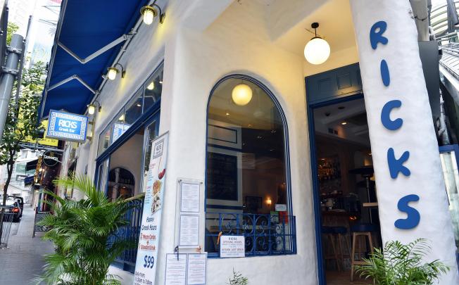 The classic blue and white exterior of Ricks Greek Bar, in SoHo. Photos: Warton Li