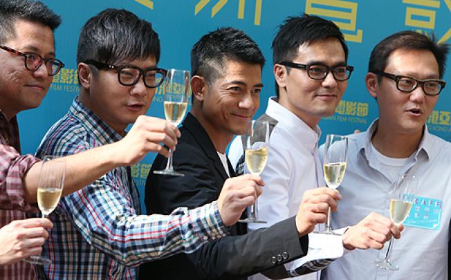 (From left) Longman Leung Lok-man, Chin Ka-lok, Aaron Kwok Fu-shing, Lam Ka-tung and Sunny Luk Kim-ching kick off the Hong Kong Asian Film Festival on Tuesday. Photo: Sam Tsang