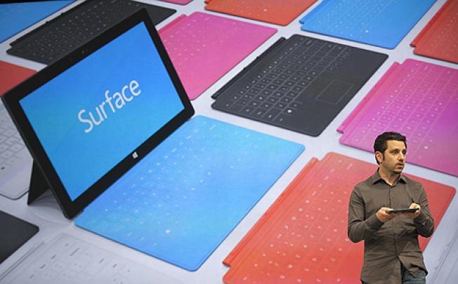 Panos Panay, general manager of the Microsoft Surface, presents the new tablet computer in June. Photo: AP