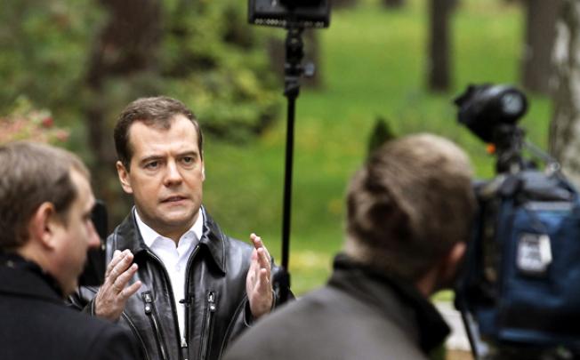 Russia's Prime Minister Dmitry Medvedev records a message on his video blog  in Moscow on October 12. Photo: AFP