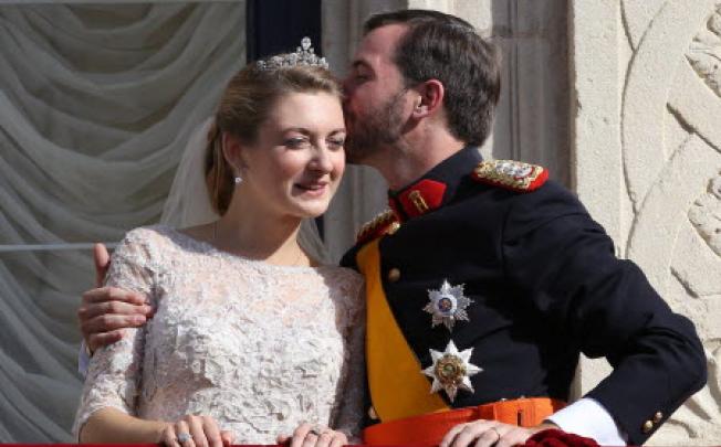 Stephanie, Hereditary Grand Duchess of Luxembourg (left) and Prince Guillaume, Hereditary Grand Duke of Luxembourg (right) after their wedding on Saturday. Photo: EPA