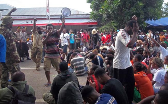A group of Papuan pro-independence protestors rally outside the University of Papua in Manokwari located in Papua province on Tuesday. Photo: AFP