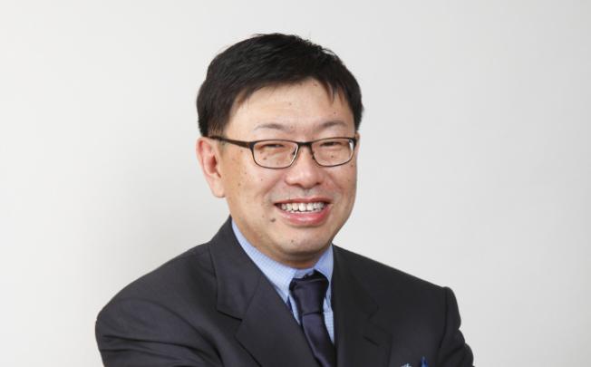 Tomoyoshi Tsuchiya, president 
