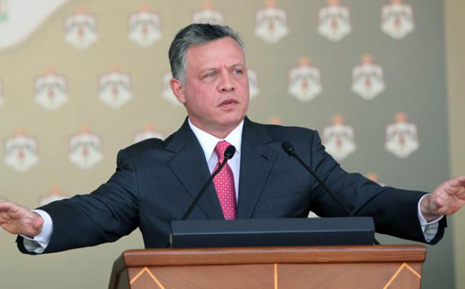 Jordan's King Abdullah II gives a speech in Amman on October 23, calling on all political parties and forces to take part in the upcoming parliamentary elections. AFP