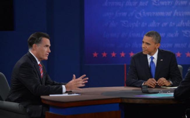 US President Barack Obama and Republican Presidential candidate Mitt Romney participate in the third and final presidential debate. Photo: AFP