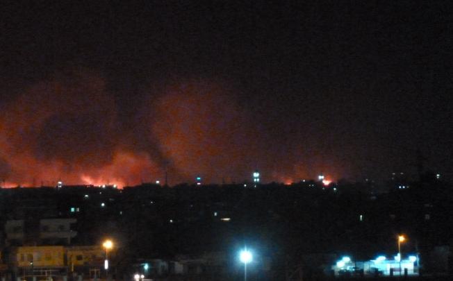 Fire raging at the state-owned Yarmouk military factory in southern Khartoum, Sudan, Wednesday, October 24. Photo: AFP