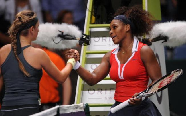 Serena Williams of the US, (right) and Victoria Azarenka of Belarus after their match on the third day of the WTA championship in Istanbul, Turkey, on Thursday. Photo: AFP