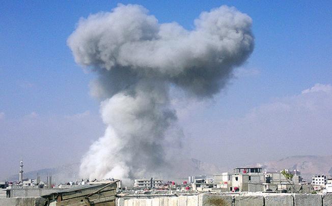 Smoke billows over Arbeen during an attack by Syrian regime forces in the outskirts of Damascus. Photo: AFP