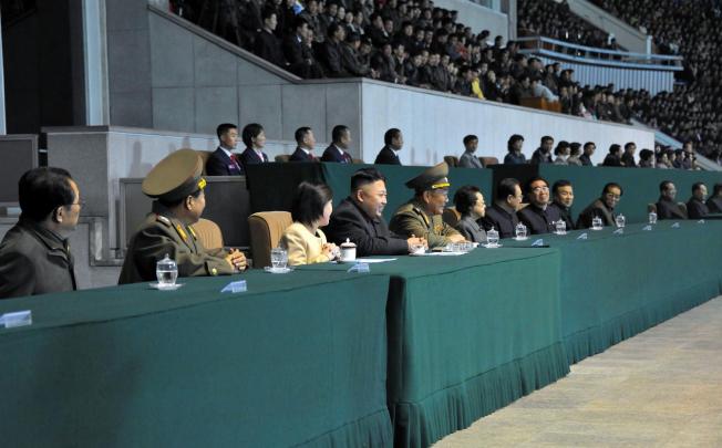 Ri Sol-ju and her husband drew "thunderous applause" at the soccer match. Photo: AFP
