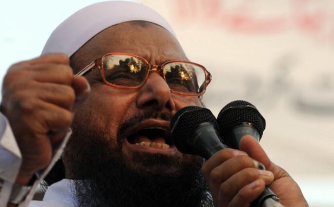 Hafiz Saeed, leader of Jamaat-ud-Dawa (JuD), addresses demonstrators at a protest in Lahore on September 30. Photo: AFP