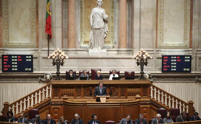 Portugal's Prime Minister Pedro Passos Coelho (centre) speaks during the opening of the debate on the state budget for 2013 at the Portuguese Parliament, in Lisbon, on Tuesday. Photo: EPA
