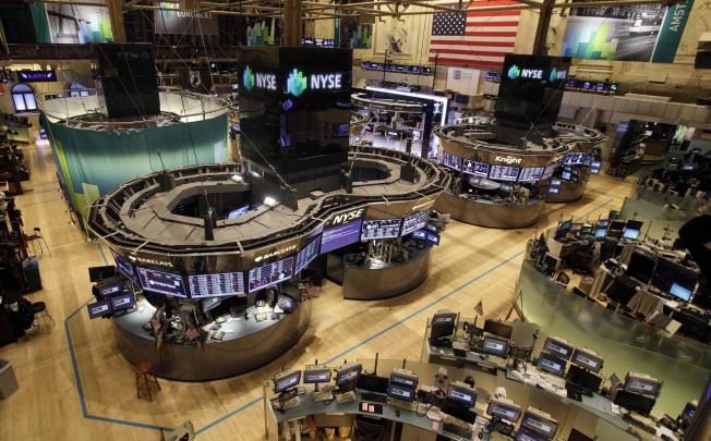 The floor of the New York Stock Exchange empty of traders on Monday, Oct. 29. Photo: AP