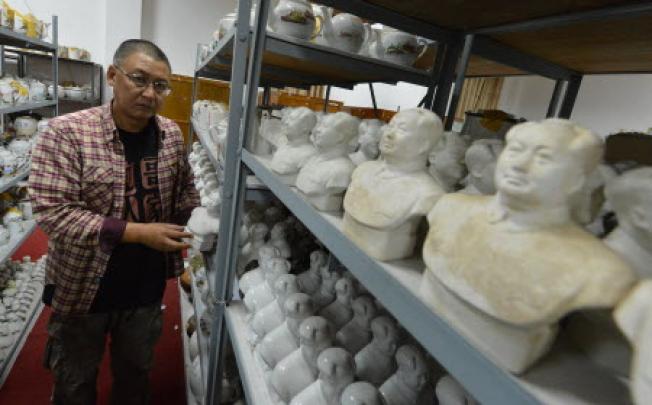 Chinese businessman Fan Jianchuan with relics of the Cultural Revolution at his museum near Chengdu, in Sichuan province. Photo: AFP