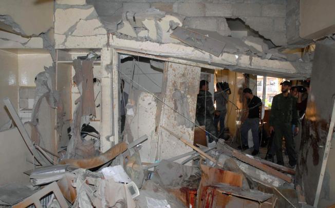The blast badly damaged the Dama Rose hotel. Photo: AFP