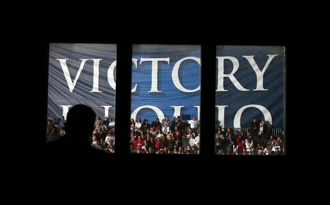 Mitt Romney eyes "Victory in Ohio" at a Columbus rally. Photo: AFP.