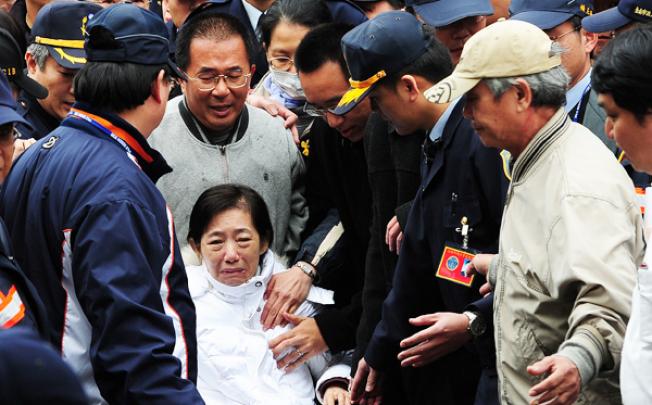 Former Taiwan president Chen Shui-bian (second left) and wife Wu Shu-chen (bottom) in January. Photo: AFP