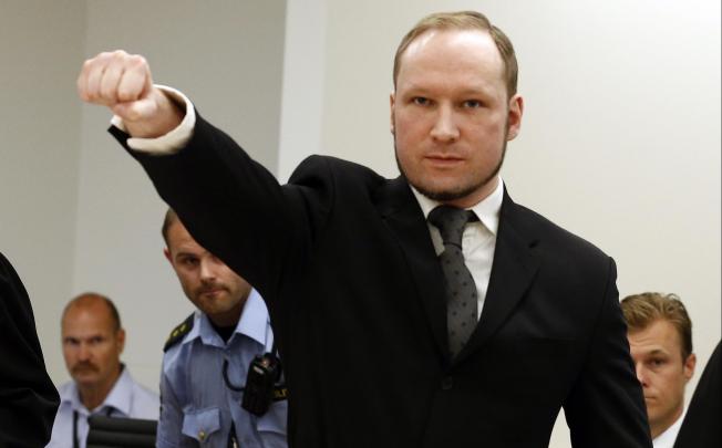 Anders Breivik salutes at his trial in Oslo in August. Photo: AP