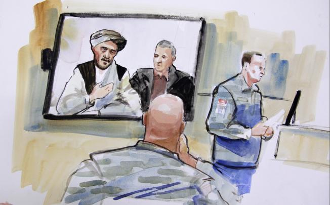 A sketch of Robert Bales (back facing) at the hearing. Photo: AP