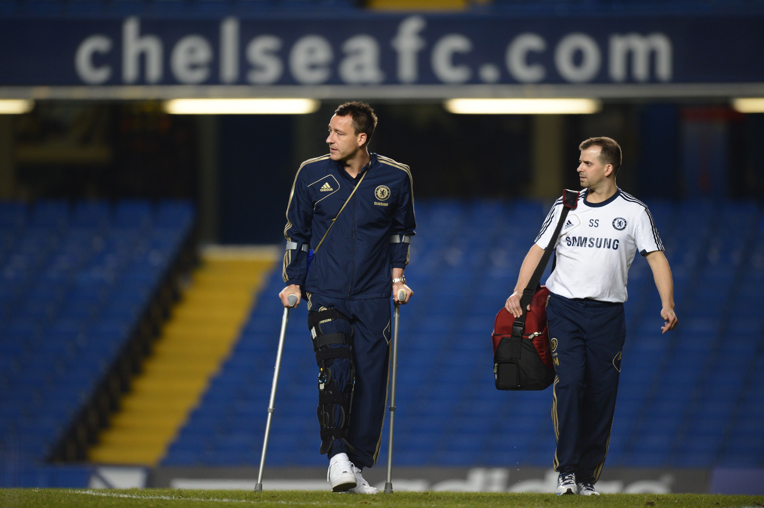 Chelsea captain John Terry on crutches after being injured in the Premiership soccer match against Liverpool at Stamford Bridge in London. Photo: AFP 