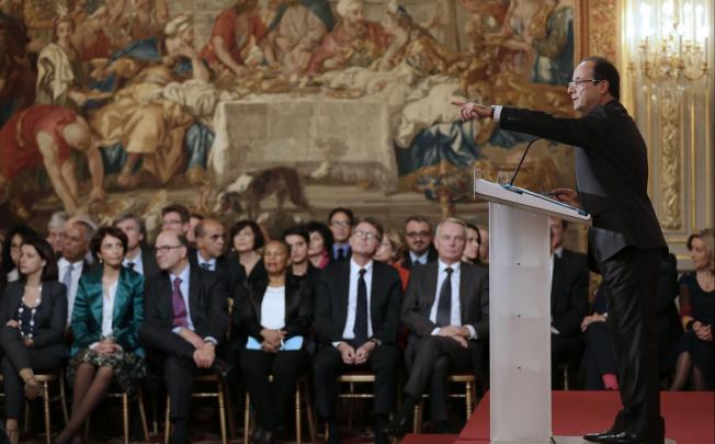 President Hollande shares his ideas with the press. Photo: AFP