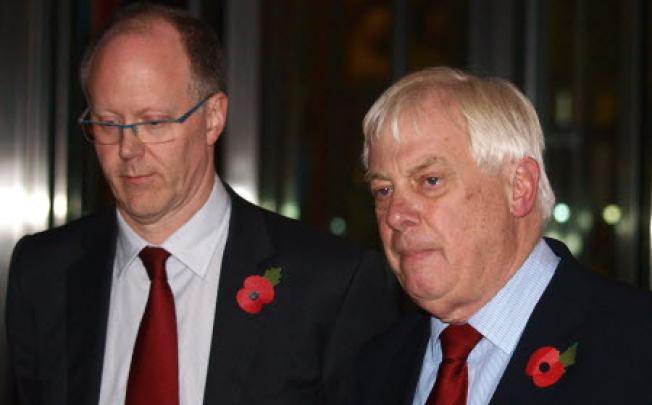 The BBC Director General, George Entwistle, left, stands with the Chairman of the BBC Trust, Lord Chris Patten. The BBC has reached a settlement with the Conservative politician wrongly implicated in a child sex abuse scandal. Photo: AP