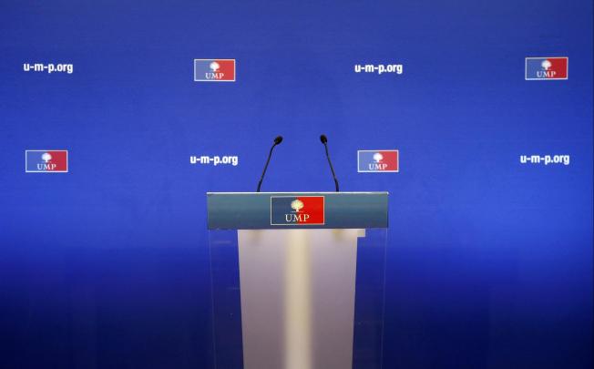 As the candidates argued over the result, an empty podium at the headquarters of the UMP in Paris seemed to say it all. Photo: Reuters