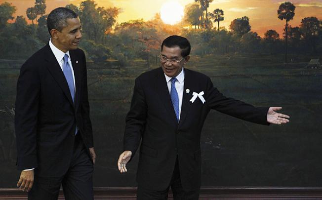 Cambodia's Prime Minister Hun Sen greets US President Barack Obama ahead of the Asean-US leaders meeting in Phnom Penh on Monday. Photo: AP 