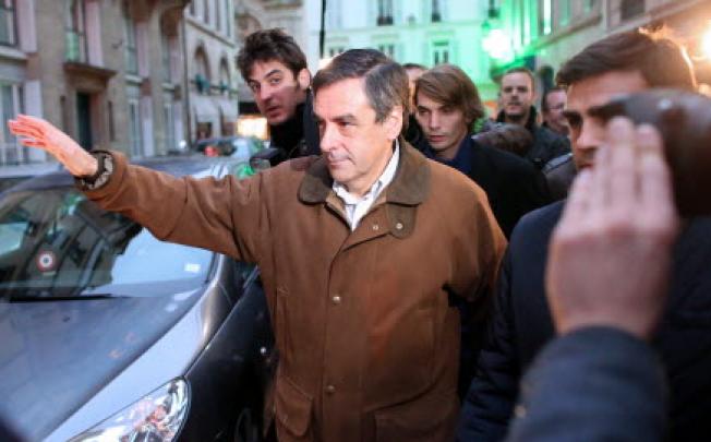Francois Fillon leaves a meeting with his his supporters, who are demanding a recount, after Jean-Francois Cope won the leadership poll by just 98 votes.  Photo: AFP 
