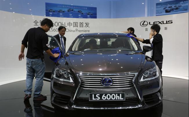 Japanese car brands on display at the Guangzhou car show this week. Sales have declined over the islands dispute. Photo: AP