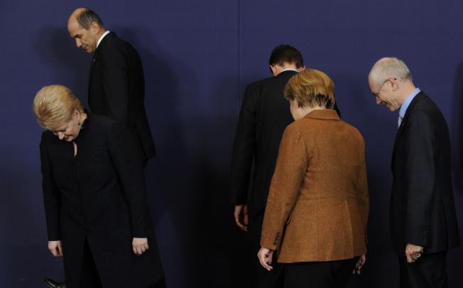 German Chancellor Dr Angela Merkel and EU President Herman Van Rompuy (right) at a crucial meeting in Brussels. Photo: AFP