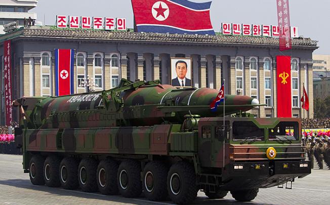 A North Korean missile launcher at a parade in Pyongyang. US satellites have picked up signs that North Korea is preparing to launch a long-range missile. Photo: AP 