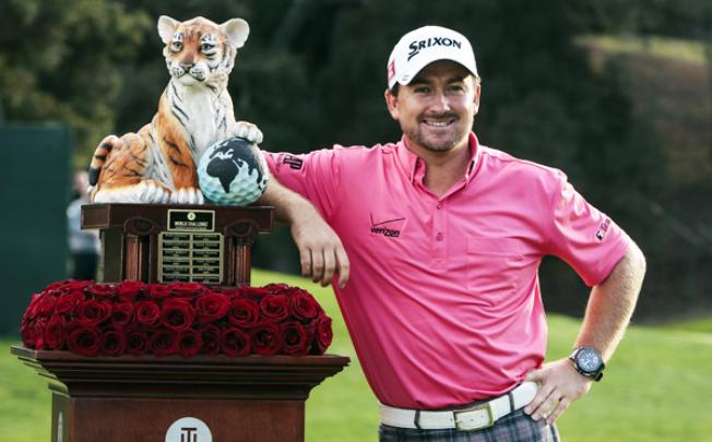 Graeme McDowell poses with the trophy after winning the World Challenge golf tournament in Thousand Oaks, California, on Sunday. Photo: AP