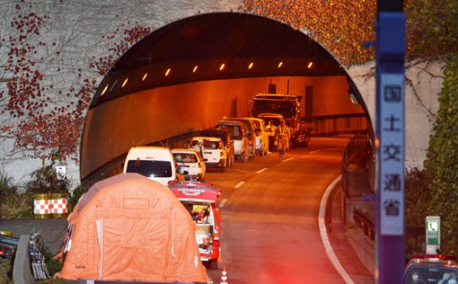 Japan ordered inspections of ageing highway tunnels on Monday after a fiery collapse that killed nine people. Photo: AFP