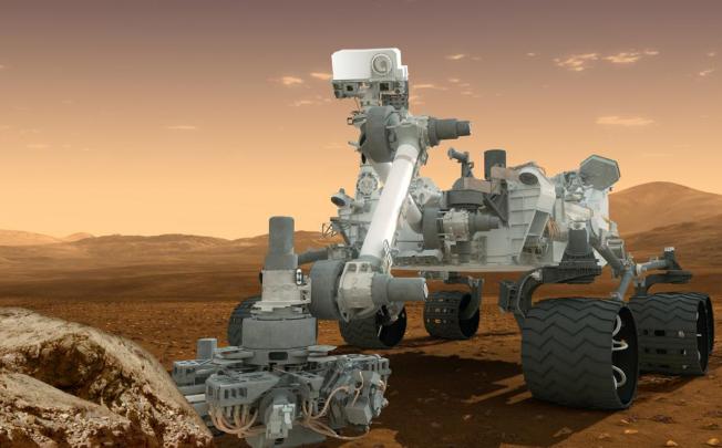This artist's rendering provided by NASA shows the Curiosity rover on the surface of Mars. Photo: AP