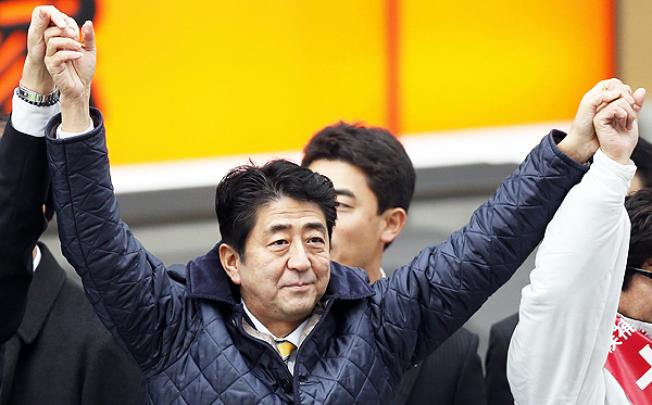 Shinzo Abe, leader of the Liberal Democratic Party (LDP), during a campaign for the Lower House election in Sendai, northern Japan. Photo: EPA
