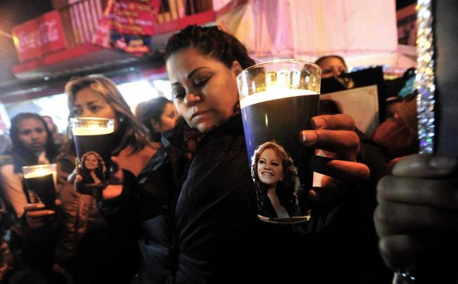 Fans of Jenni Rivera at a vigil in Monterrey, Mexico. Photo: EPA