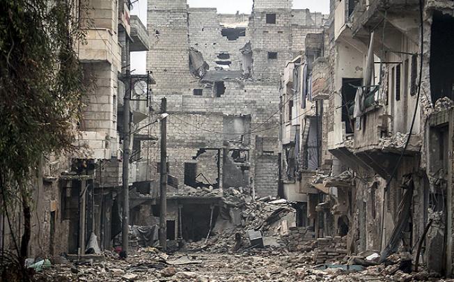 Damaged buildings in the Amarya district of Aleppo, Syria. Photo: AP