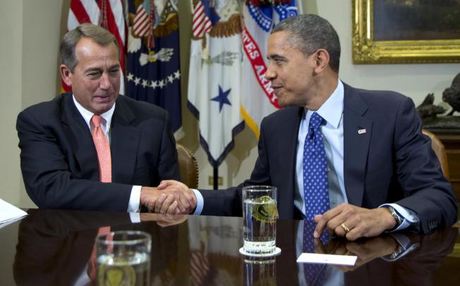 Game on for John Boehner and Barack Obama.Photo: AP