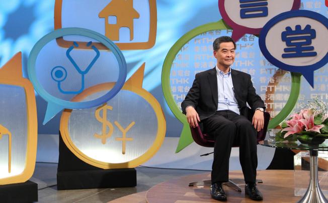 Leung Chun-ying appears to be sitting slightly uneasily as he faces the audience at the RTHK forum yesterday. Photo: Nora Tam